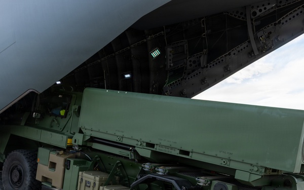 U.S. Marines, U.K. Airmen load Australian Strike Master vehicle onto Airbus A400M Atlas aircraft