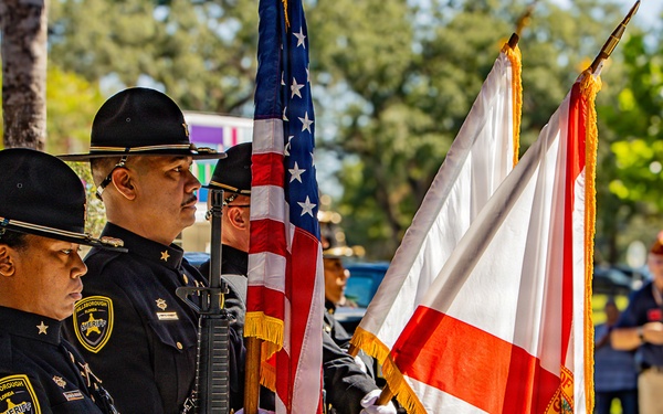 Honor guard presents colors during Tampa Buffalo Soldiers Monument dedication