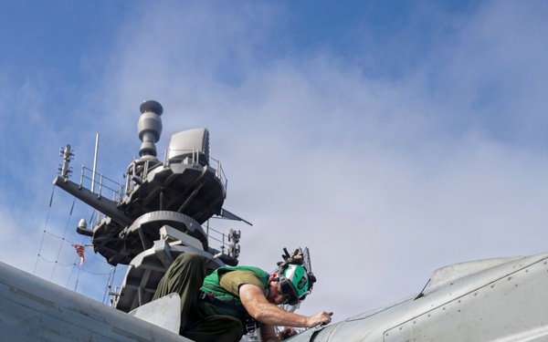 U.S. Marine Performs Maintenance on an MV-22B