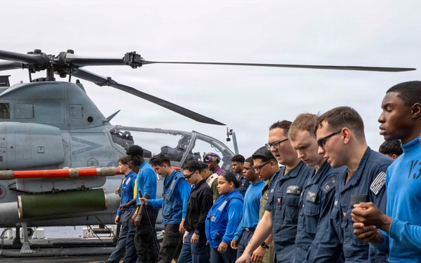 U.S. Navy Sailors and U.S. Marines Participate in FOD Walk