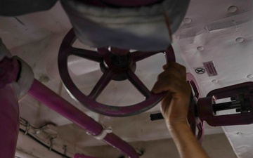 U.S. Navy Sailor Cyles Fuel Valve