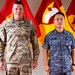 Two military personnel are posing together in front of multiple military unit flags. The individual on the left wears a U.S. Army OCP (Operational Camouflage Pattern) uniform with a name tape reading 'PARKER' and a single star indicating the rank of Brigadier General. The individual on the right wears a Republic of Korea (ROK) Air Force uniform with Korean script name tapes and the text '대한민국 공군' (Republic of Korea Air Force).