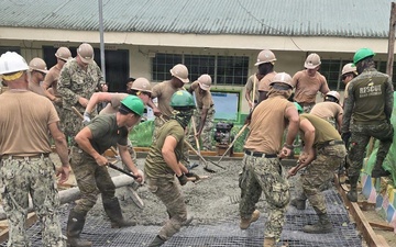 Naval Mobile Construction Battalion 5 Seabees Place Concrete With Philippines Army