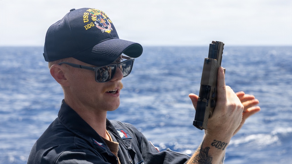 USS Mustin conducts weapons familiarization course
