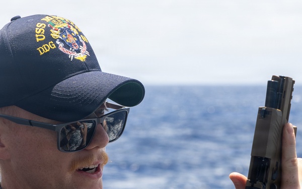 USS Mustin conducts weapons familiarization course
