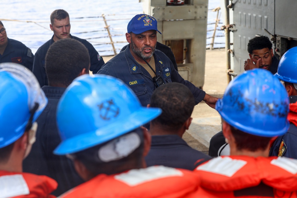 USS Oscar Austin (DDG 79) conducts man overboard drill