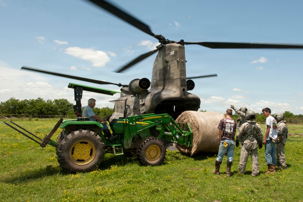 Oklahoma Guard helps feed stranded cows