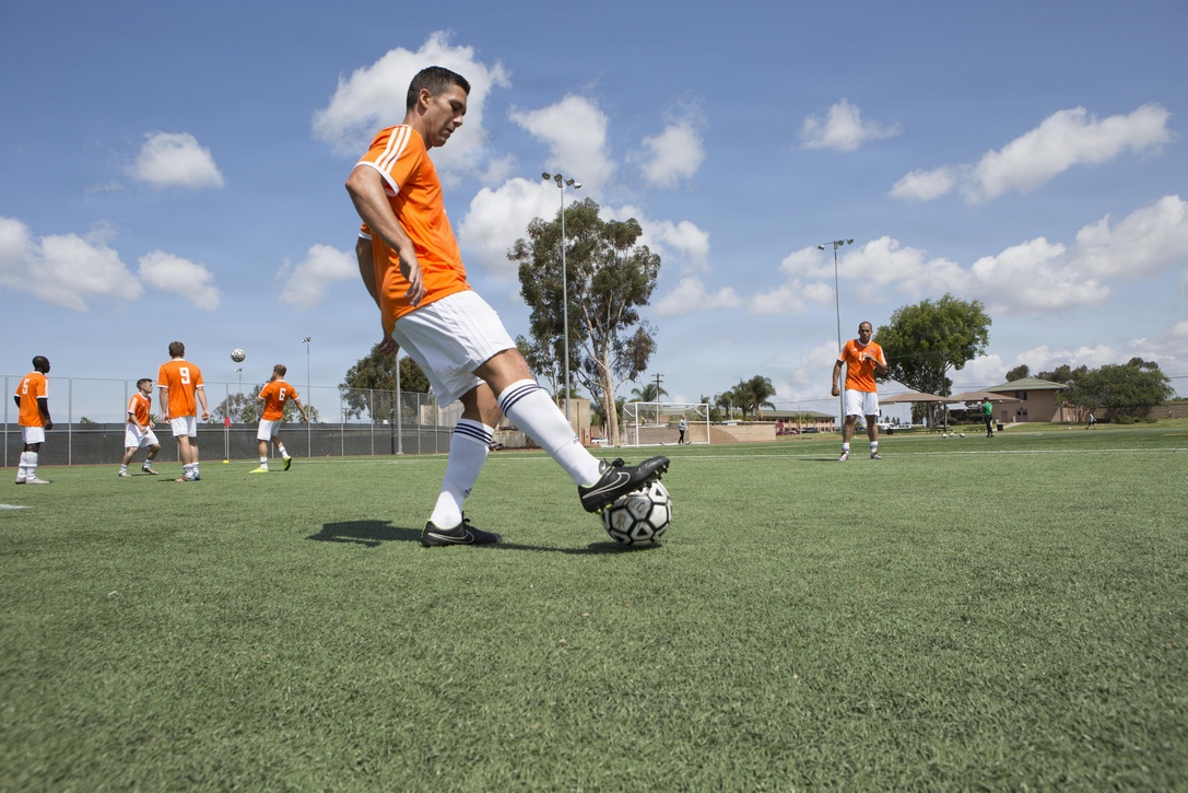U.S. Armed Forces men's Navy soccer team warms up during the 2015 Armed Forces Men's Soccer Championship at the Miramar Sports Complex aboard Marine Corps Air Station Miramar, San Diego, Calif., May 14, 2015. The Armed Forces Champions are conducted by the Armed Forces Sports Council for the purpose of promoting understanding, good will and competition among the Armed Forces. (U.S. Marine Corps photo by Lance Cpl. Travis Jordan/Released)
