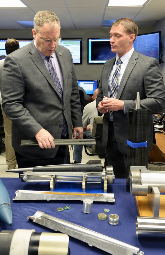 Deputy Secretary of Defense Bob Work is being shown the different types of hypervelocity projectile during his visit to the Naval Surface Warfare Center Dahlgren Division, Dahlgren, VA on April 30, 2015.