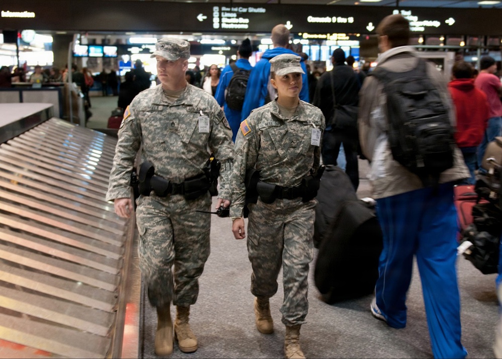 Army Staff Sgt. Jason Steele and Army Pvt. Chelsea Neil