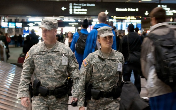 Army Staff Sgt. Jason Steele and Army Pvt. Chelsea Neil