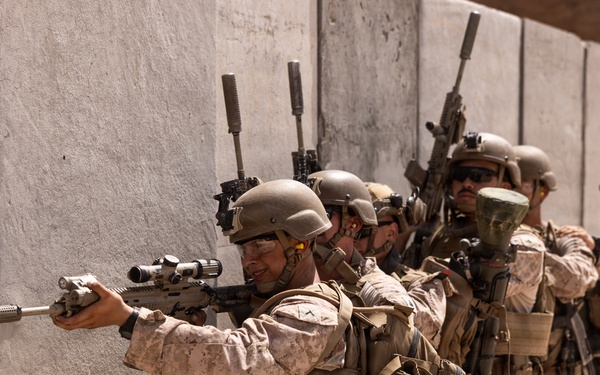U.S. Marines with Echo Co., 2nd Bn., 1st Marines, execute urban squad assaults