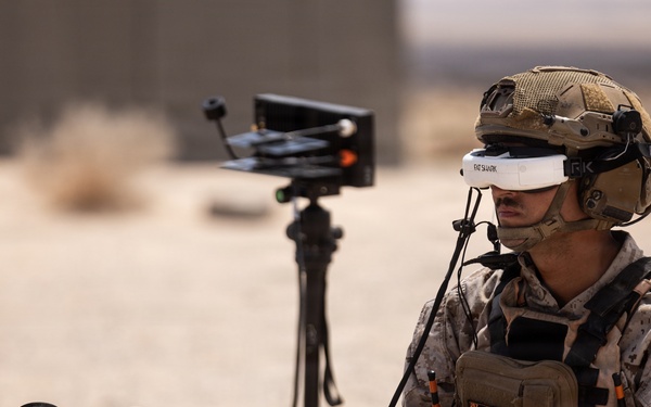 U.S. Marines with Echo Co., 2nd Bn., 1st Marines, execute urban squad assaults