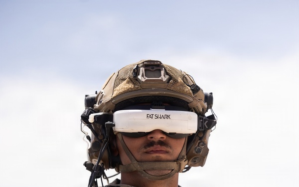 U.S. Marines with Echo Co., 2nd Bn., 1st Marines, execute urban squad assaults