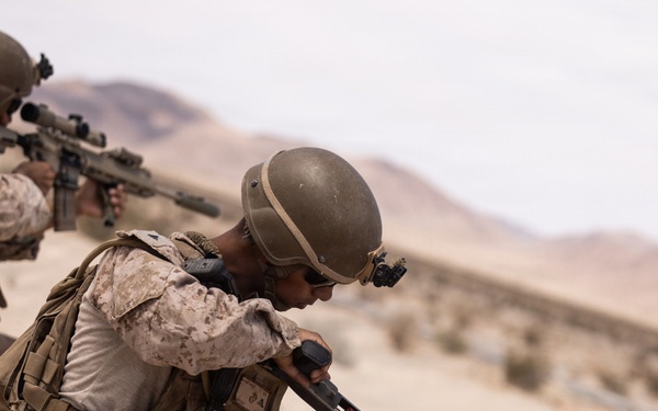 U.S. Marines with Echo Co., 2nd Bn., 1st Marines, execute urban squad assaults
