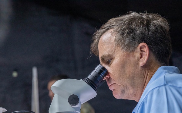 Dr. Craig Stoops researches and analyses clusters of mosquitos