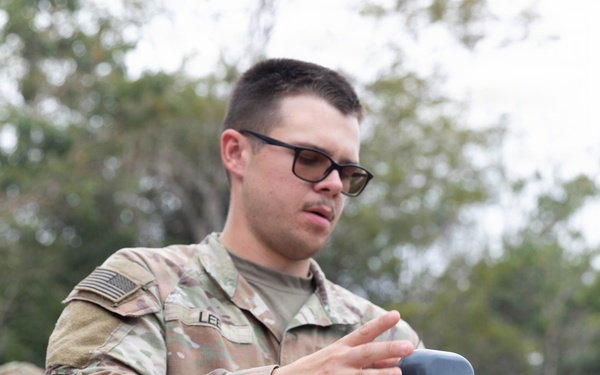 U.S. Army Spc. Craig Lee tests the quality of the water