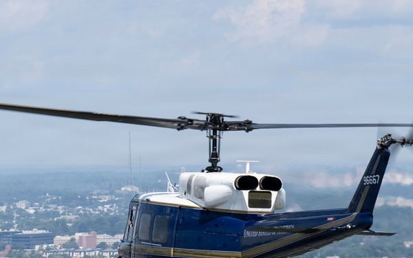 USAF UH-1N Hueys conduct media flight from JBA