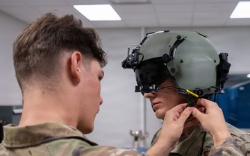 A1C Brady Stemmle performs equipment maintenance