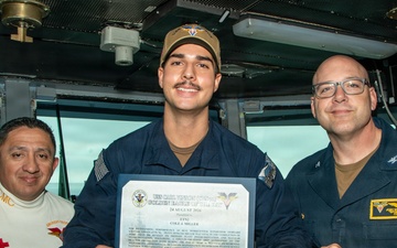 USS Carl Vinson (CVN 70) presents Gold Eagle of the Day award