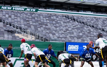 Marines, Soldiers, and families, represent Fort Hamilton during the Annual Salute to Service Bowl at MetLife Stadium.