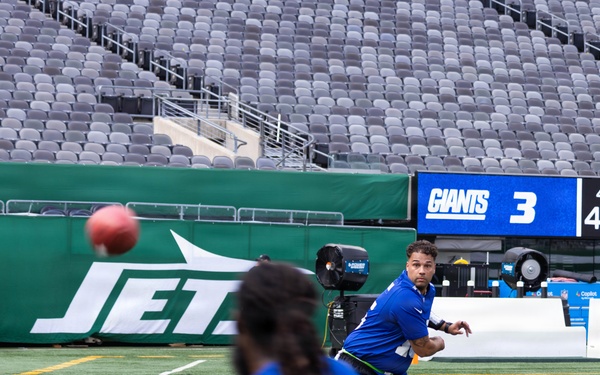 Marines, Soldiers, and families, represent Fort Hamilton during the Annual Salute to Service Bowl at MetLife Stadium.