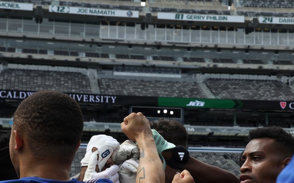 Marines, Soldiers, and families, represent Fort Hamilton in the annual Salute to Service Bowl at MetLife Stadium.