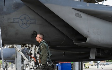144FW commander Col. Travis "Plague" Stephens prepares for a flight