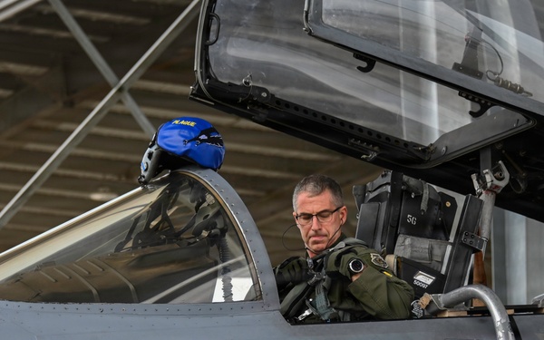 144FW commander Col. Travis "Plague" Stephens prepares for a flight