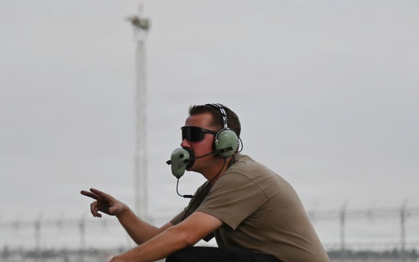 144FW commander Col. Travis "Plague" Stephens prepares for a flight