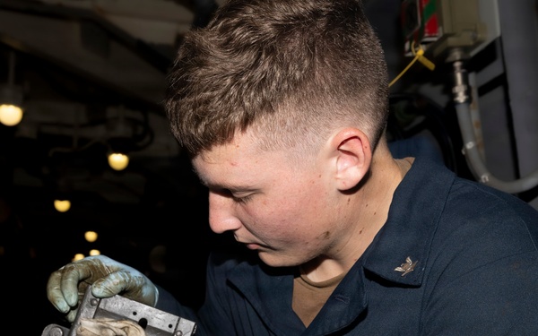 Delbert D. Black Sailors Conduct Maintenance