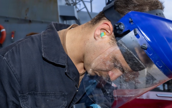 Delbert D. Black Sailors Conduct Maintenance