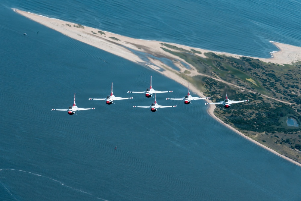 Thunderbirds fly over Statue of Liberty