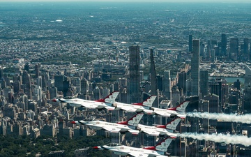 Thunderbirds fly over Statue of Liberty