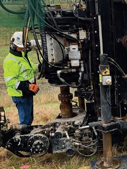 Contractor Operates Drill Rig During Ground Investigation at Military Installation