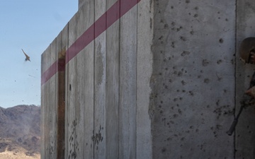 U.S. Marines with Golf Co., 2nd Bn., 1st Marines conduct platoon-level urban assaults
