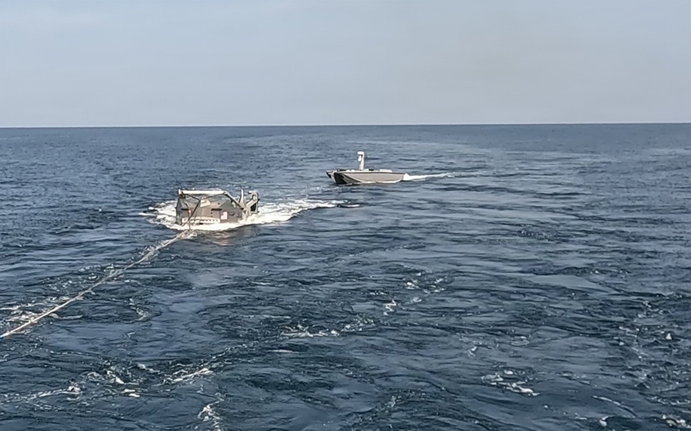 Naval Air Warfare Center Weapons Division’s Blue Water Instrumentation refuels unmanned surface vessel at sea using robotic towed connector