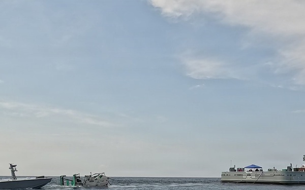 Naval Air Warfare Center Weapons Division’s Blue Water Instrumentation refuels unmanned surface vessel at sea using robotic towed connector