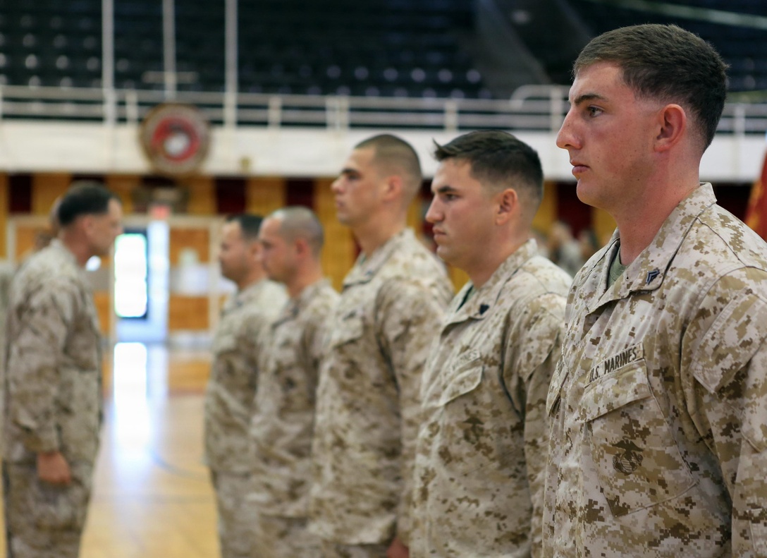 Col. Frank Donovan, the former commanding officer of the 24th Marine Expeditionary Unit, presents a Navy and Marine Corps Medal to Cpl. Steve R. Hanson, team leader, Bravo Company, Battalion Landing Team 1st Battalion, 2nd Marine Regiment, during an awards ceremony June 3, 2013, at Camp Lejeune, N.C. Hanson was one of five Marines awarded for actions during the ceremony while deployed with the 24th MEU in 2012. The Navy and Marine Corps Medal is the highest non-combatant medal awarded by the Department of the Navy to member of the U.S. Navy and Marine Corps.


