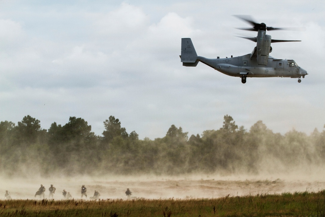 A MV-22B Osprey from Marine Medium Tiltrotor Squadron 365 (Reinforced) takes off after dropping off Marines with Battalion Landing Team 3rd Battalion, 6th Marine Regiment, 24th Marine Expeditionary Unit, at Camp Lejeune, N.C., June 5, 2014. The two major subordinate elements were supporting Combat Logistics Battalion 24, in a simulated non-combatant evacuation operation to better prepare for the upcoming 24th MEU deployment later this year. (U.S. Marine Corps photo by Cpl. Devin Nichols)
