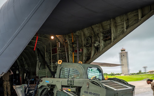 Joint service members load cargo for Nepal lifesaving operations