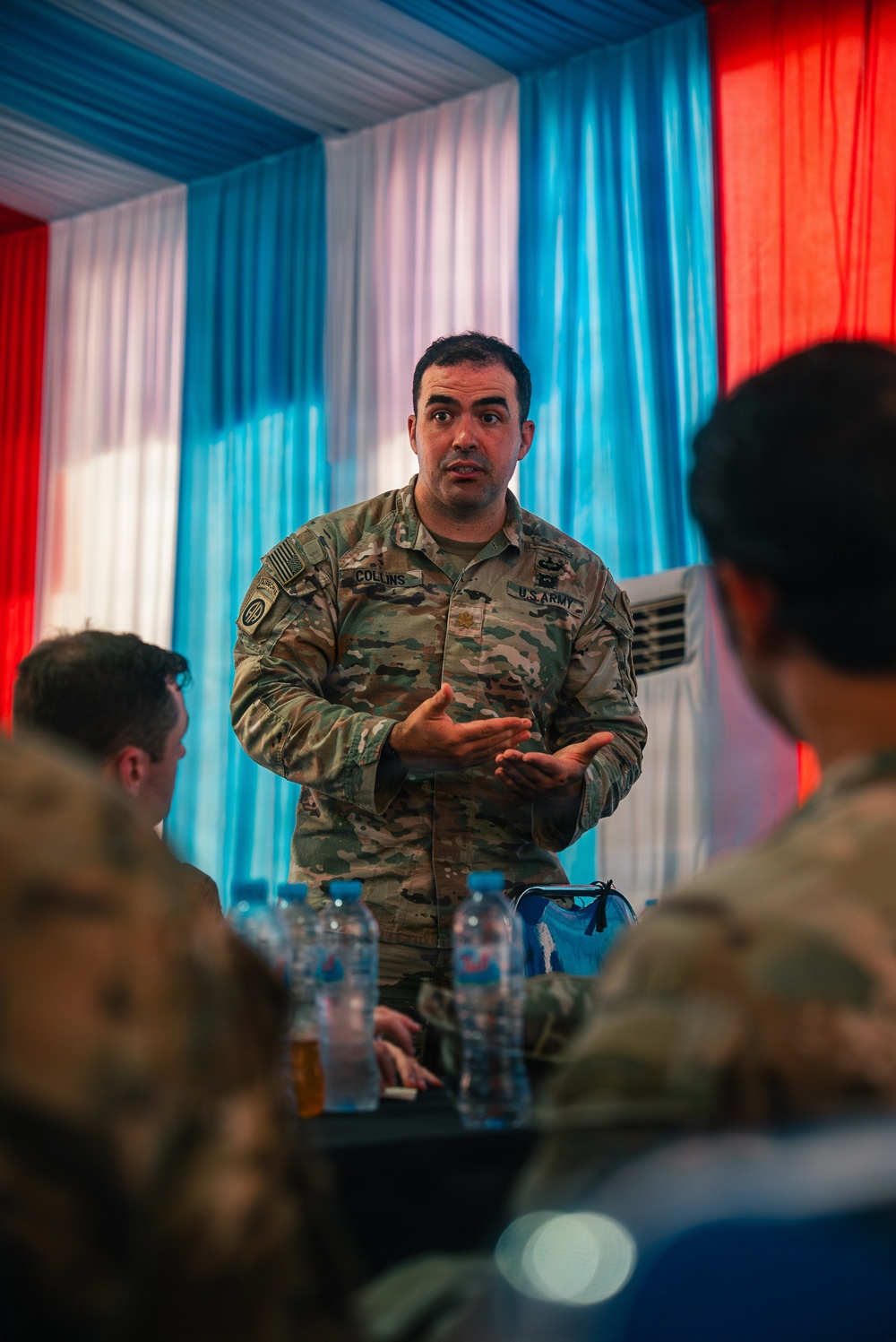 1st Special Force Group (Airborne) Green Berets coordinate an Upcoming Airborne Operation with 1st Battalion 501st Infantry Regiment, 2nd Brigade, 11th Airborne Division