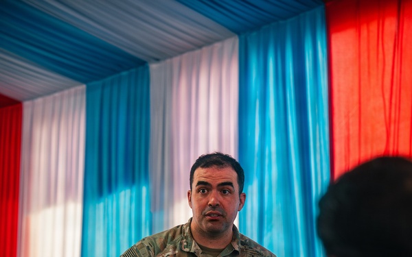 1st Special Force Group (Airborne) Green Berets coordinate an Upcoming Airborne Operation with 1st Battalion 501st Infantry Regiment, 2nd Brigade, 11th Airborne Division