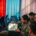 1st Special Force Group (Airborne) Green Berets coordinate an Upcoming Airborne Operation with 1st Battalion 501st Infantry Regiment, 2nd Brigade, 11th Airborne Division