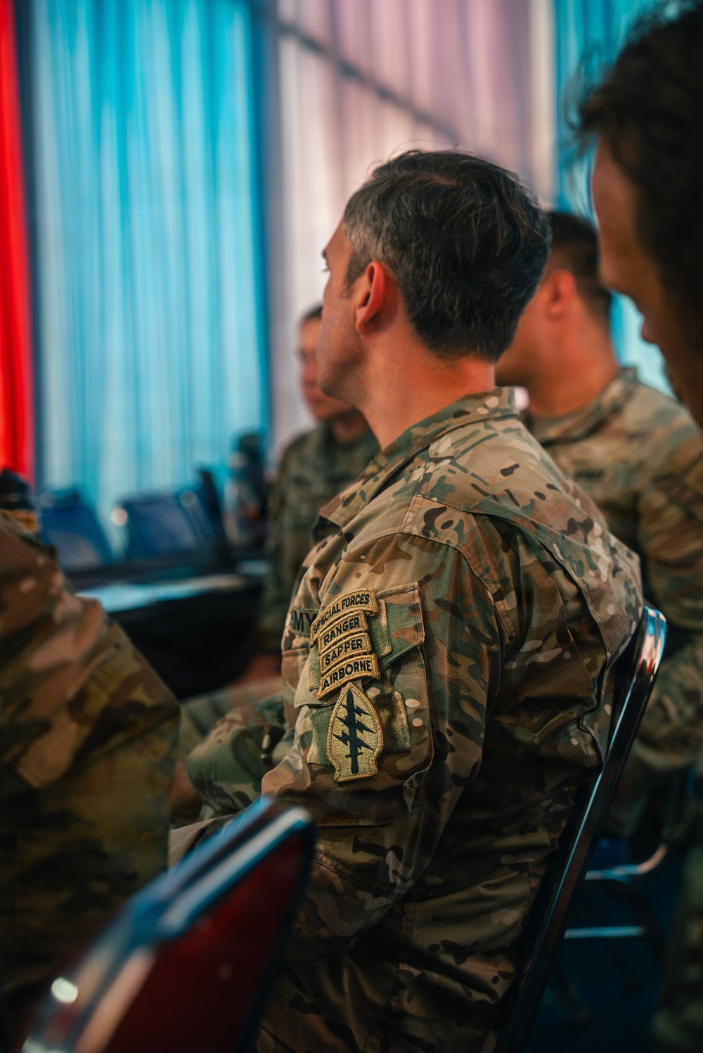 1st Special Force Group (Airborne) Green Berets coordinate an Upcoming Airborne Operation with 1st Battalion 501st Infantry Regiment, 2nd Brigade, 11th Airborne Division