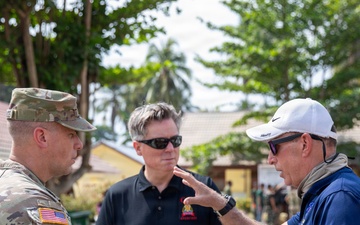U.S. Army Col. Robert Lawrence speaks with Michael Thomas