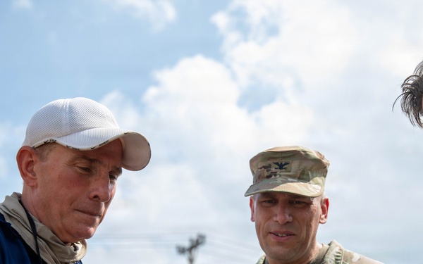 U.S. Army Col. Robert Lawrence watches a video