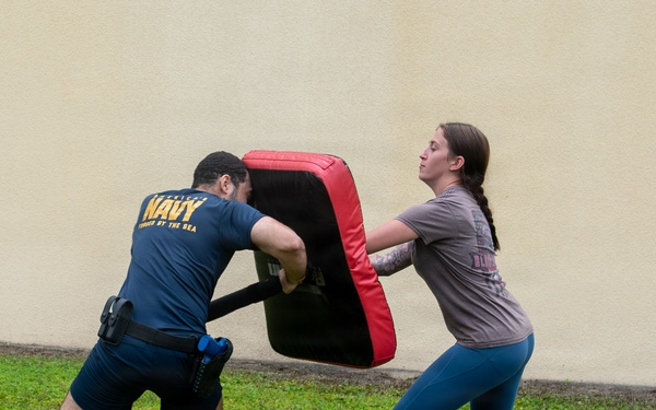 Sailors participate in oleoresin capsicum (OC) Course