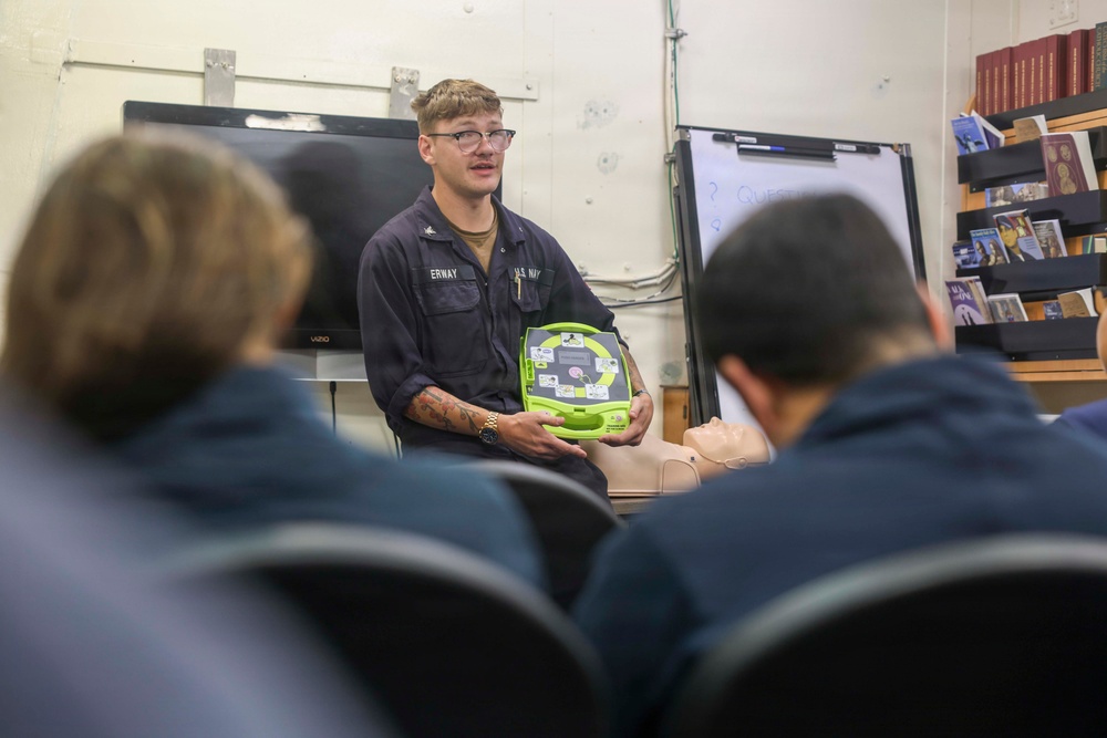 Sailors conduct CPR training aboard USS Oscar Austin
