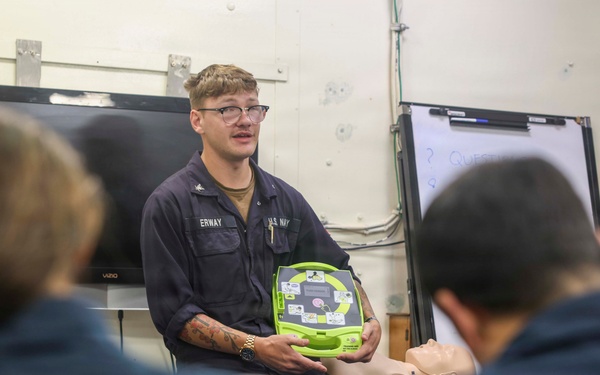 Sailors conduct CPR training aboard USS Oscar Austin